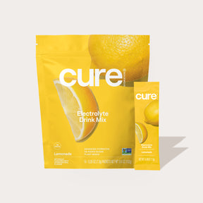 Cure Electrolyte Drink Mix Lemonade flavor packaging with lemon slice and whole lemon images